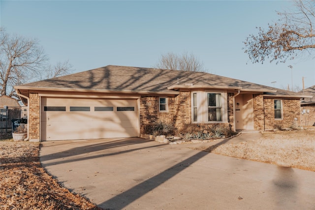 ranch-style home with a garage