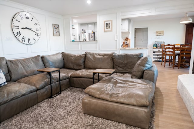 living room with light hardwood / wood-style flooring