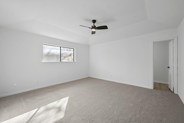 empty room with ceiling fan and carpet flooring