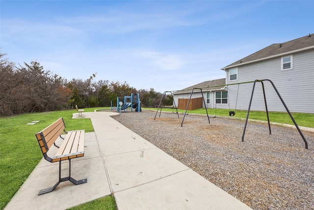 view of playground with a yard