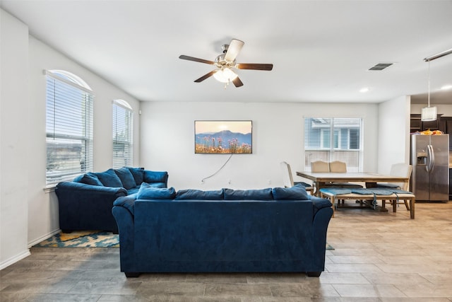 living room with ceiling fan