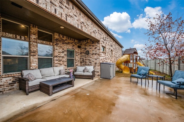 view of patio / terrace featuring a playground and an outdoor hangout area