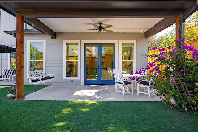 view of patio with french doors and ceiling fan