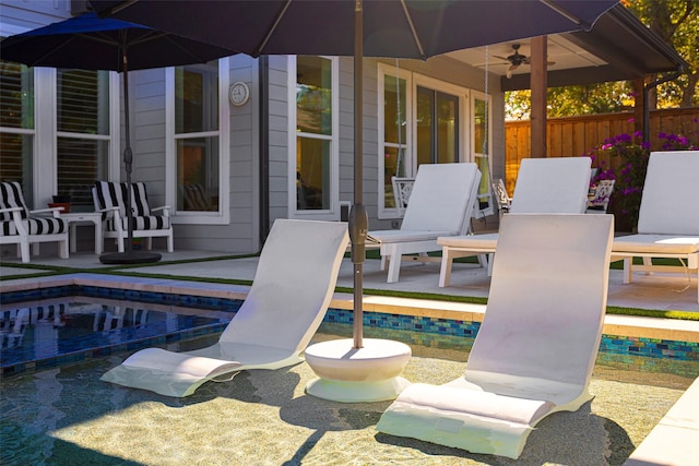 view of patio / terrace featuring ceiling fan