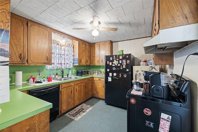 kitchen featuring ceiling fan, sink, and black appliances