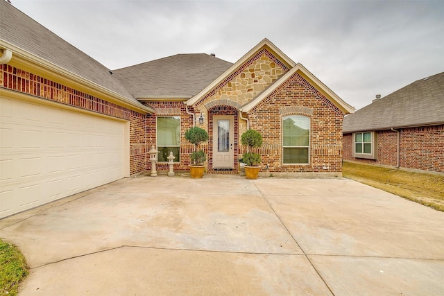 view of front of property with a garage