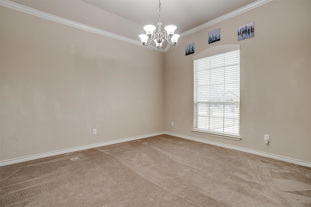 carpeted empty room with ornamental molding and an inviting chandelier