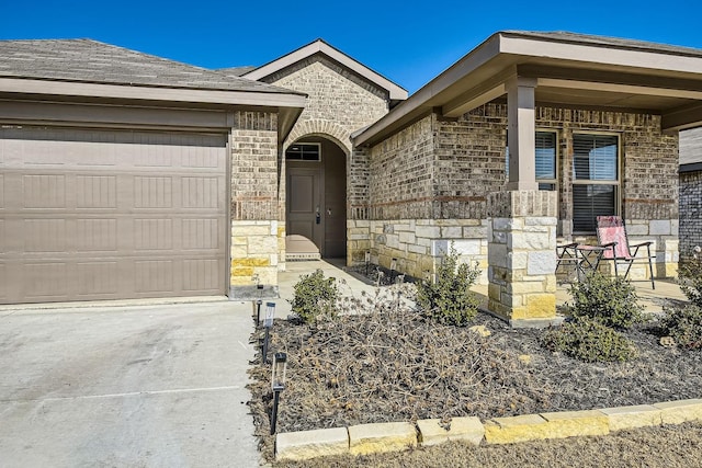 entrance to property featuring a garage