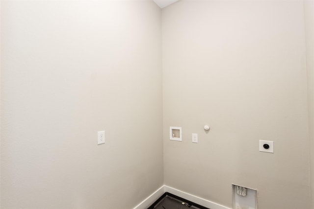 clothes washing area with washer hookup, hookup for a gas dryer, and electric dryer hookup