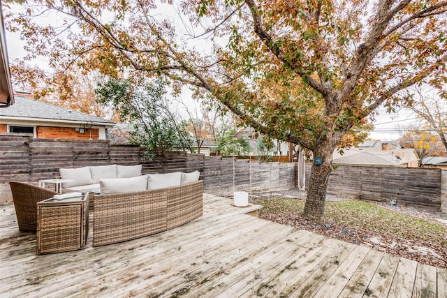 wooden terrace featuring an outdoor hangout area