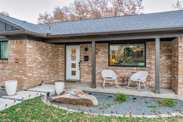 entrance to property with a patio