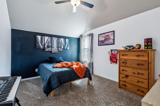 bedroom with ceiling fan, vaulted ceiling, and carpet