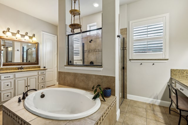 bathroom with tile patterned floors, vanity, and plus walk in shower