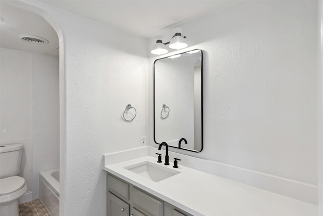 full bathroom featuring shower / tub combination, vanity, and toilet