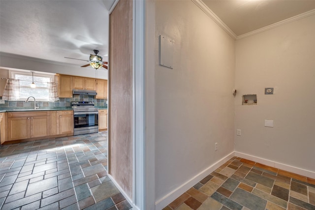 kitchen featuring sink, crown molding, electric range, ceiling fan, and backsplash