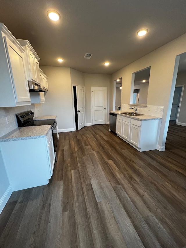 kitchen featuring white cabinetry, electric range oven, dark hardwood / wood-style flooring, and stainless steel dishwasher