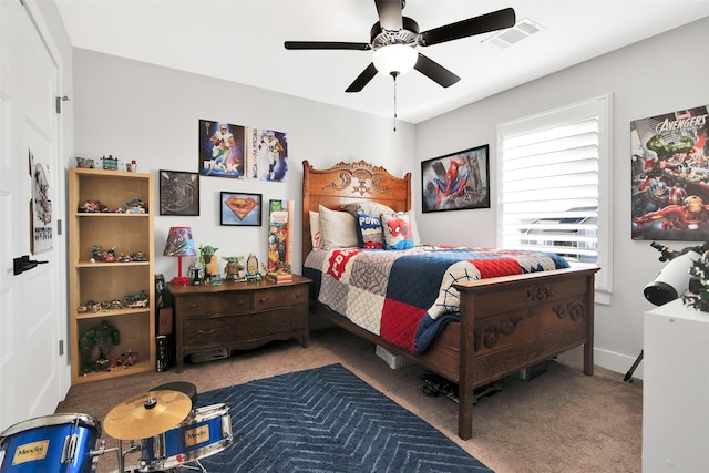 bedroom with ceiling fan and carpet floors