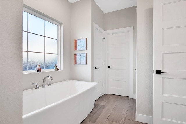 bathroom with a bathing tub