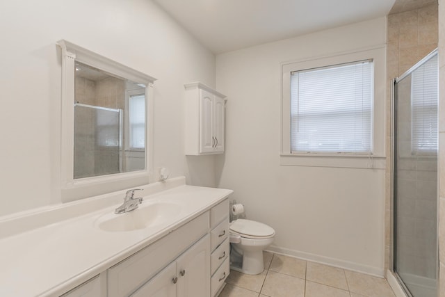 bathroom with vanity, toilet, a shower with shower door, and tile patterned flooring