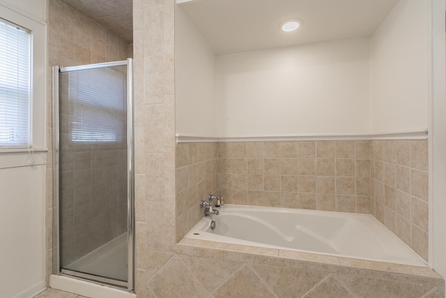 bathroom with independent shower and bath