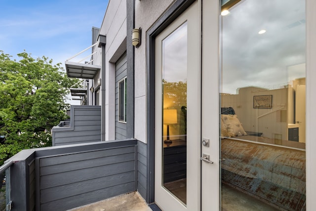 doorway to property with a balcony