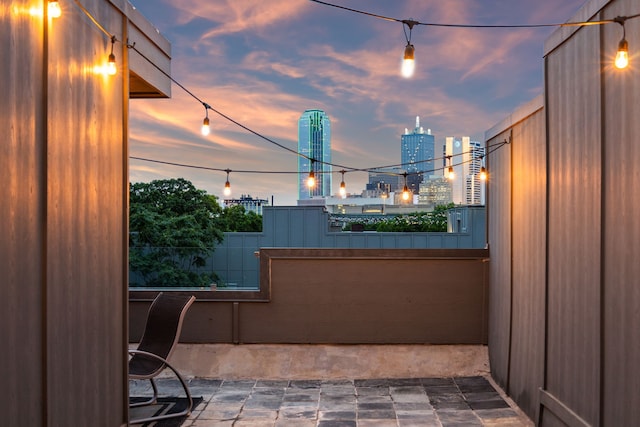 view of patio terrace at dusk