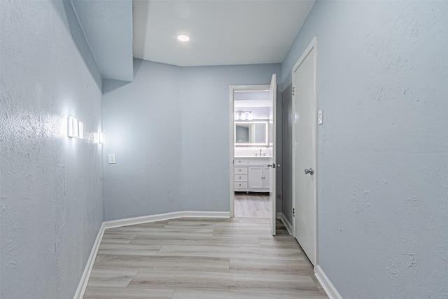 hallway featuring light hardwood / wood-style floors