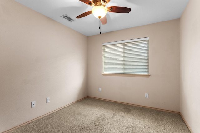 unfurnished room featuring carpet and ceiling fan