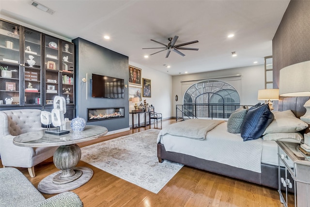 bedroom with light hardwood / wood-style flooring