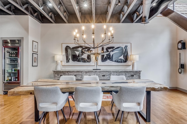 dining space with light hardwood / wood-style floors