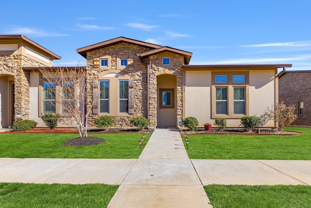 view of front of property with a front lawn