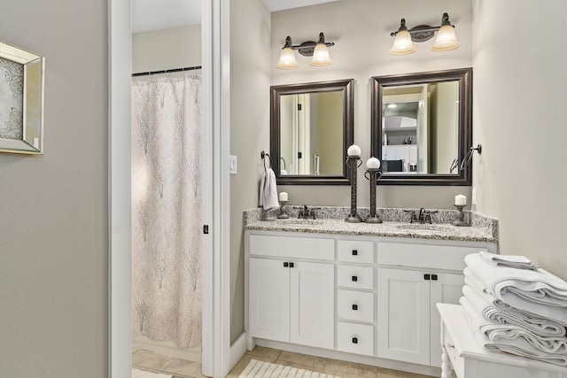 bathroom with vanity and curtained shower