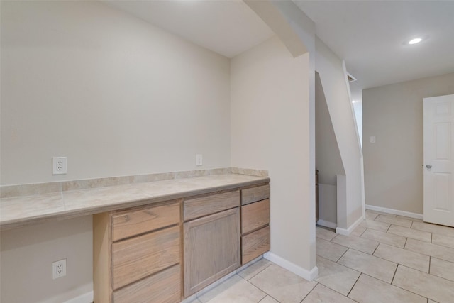 bathroom with tile patterned flooring