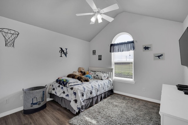 bedroom featuring vaulted ceiling, dark hardwood / wood-style floors, and ceiling fan