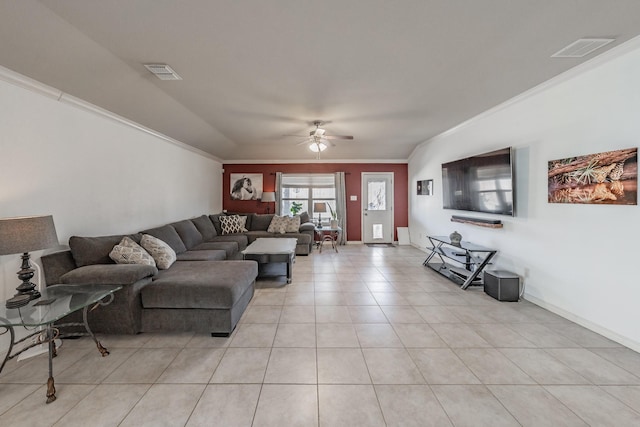 living room with crown molding, light tile patterned floors, and ceiling fan