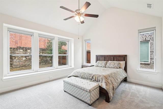 bedroom featuring high vaulted ceiling, ceiling fan, and carpet