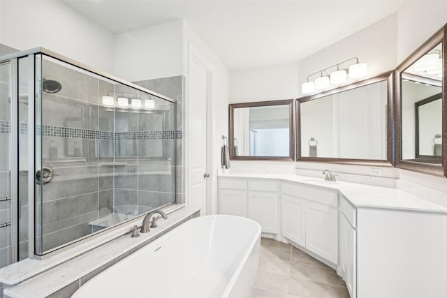 bathroom featuring vanity, plus walk in shower, and tile patterned flooring