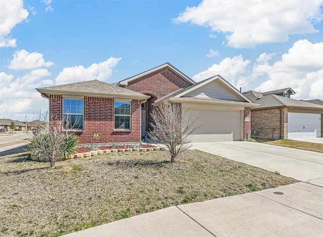 ranch-style house with a garage, concrete driveway, and brick siding