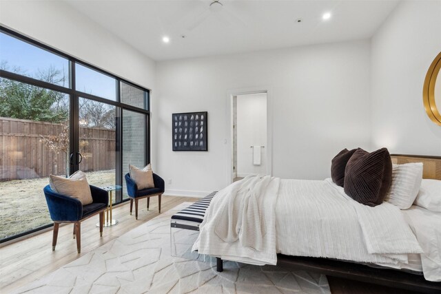 bedroom featuring access to exterior, baseboards, ceiling fan, recessed lighting, and light wood-style flooring