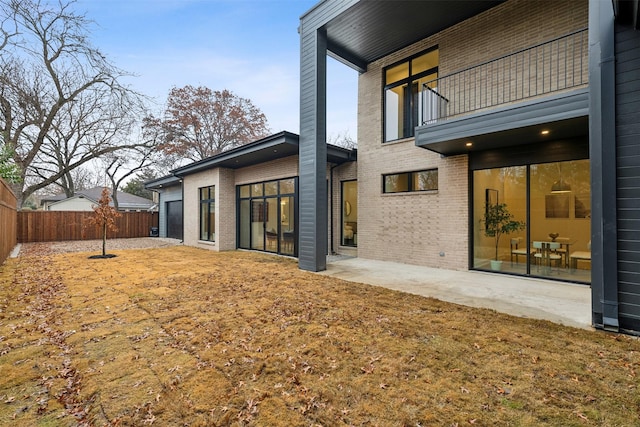 rear view of house featuring a patio area