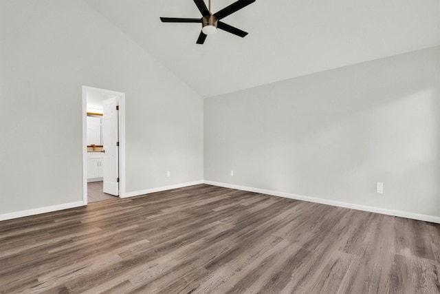 spare room with ceiling fan, high vaulted ceiling, and dark hardwood / wood-style flooring