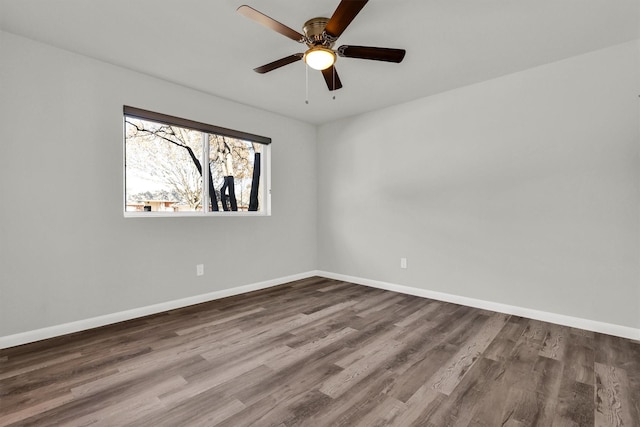 unfurnished room with wood-type flooring and ceiling fan