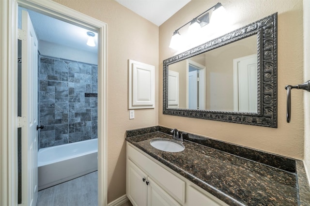 bathroom featuring vanity and hardwood / wood-style floors