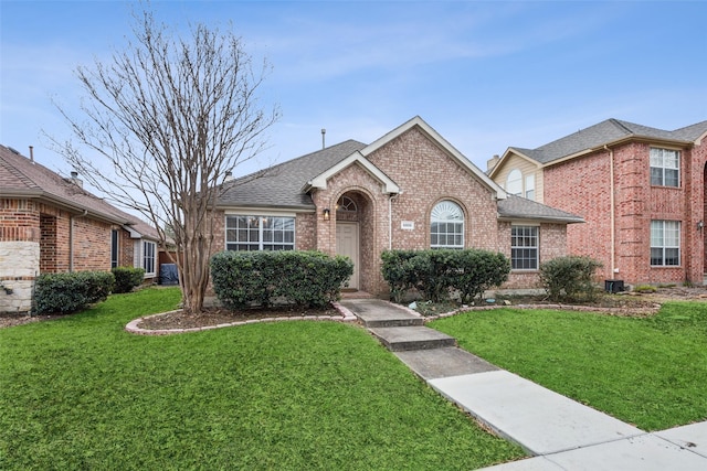 view of front of home with a front yard