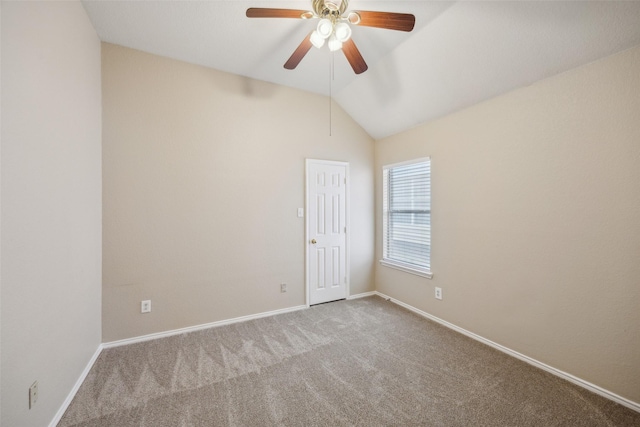 unfurnished room with ceiling fan, vaulted ceiling, and light carpet