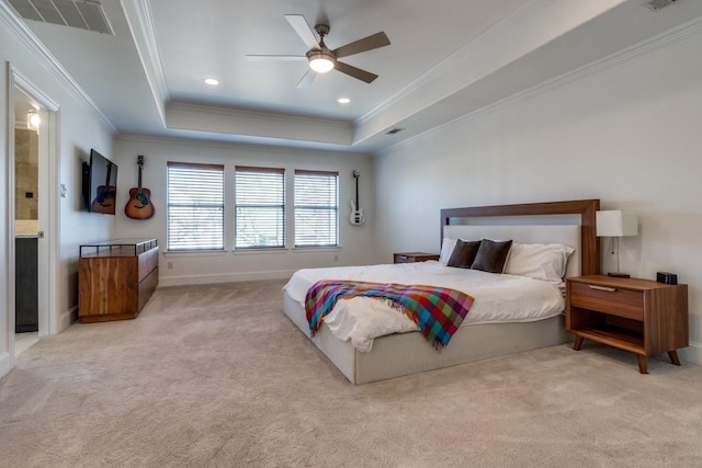 bedroom featuring crown molding, light colored carpet, a raised ceiling, and ceiling fan