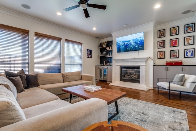 living room with crown molding and dark hardwood / wood-style floors