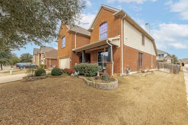 view of side of home with a garage and a yard