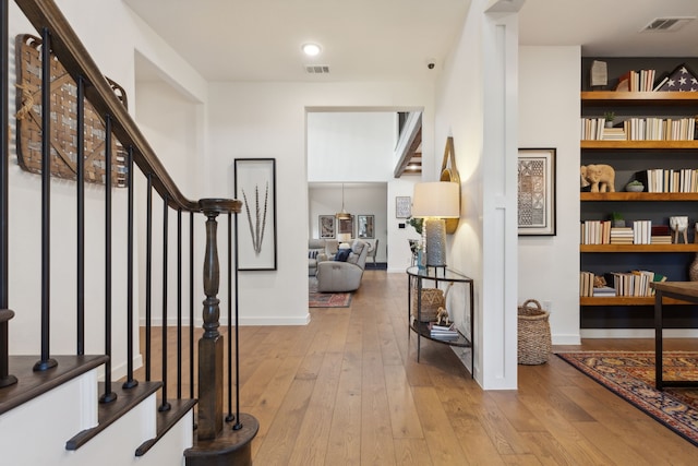 foyer with light hardwood / wood-style floors