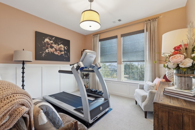 workout area with light colored carpet